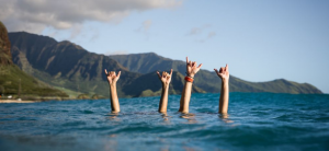 Surfers shaka